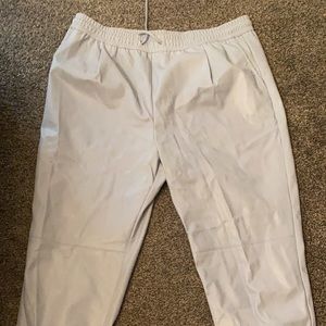 Zara baby blue faux leather joggers with cuffed ankles.